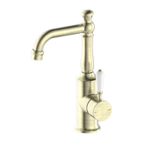 Nero York Basin Mixer With White Porcelain Lever - Aged Brass